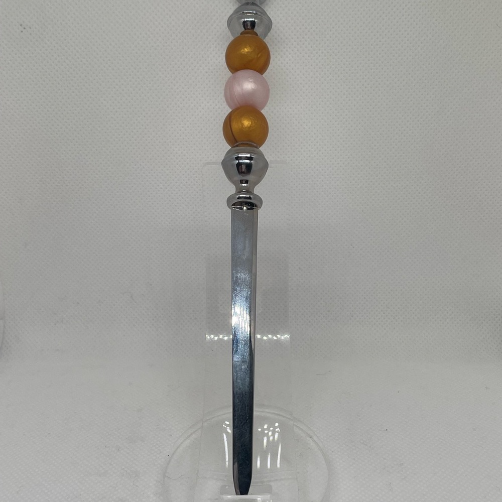 Elegant Beaded Letter Opener
Expertly Handcrafted, Exclusively Yours